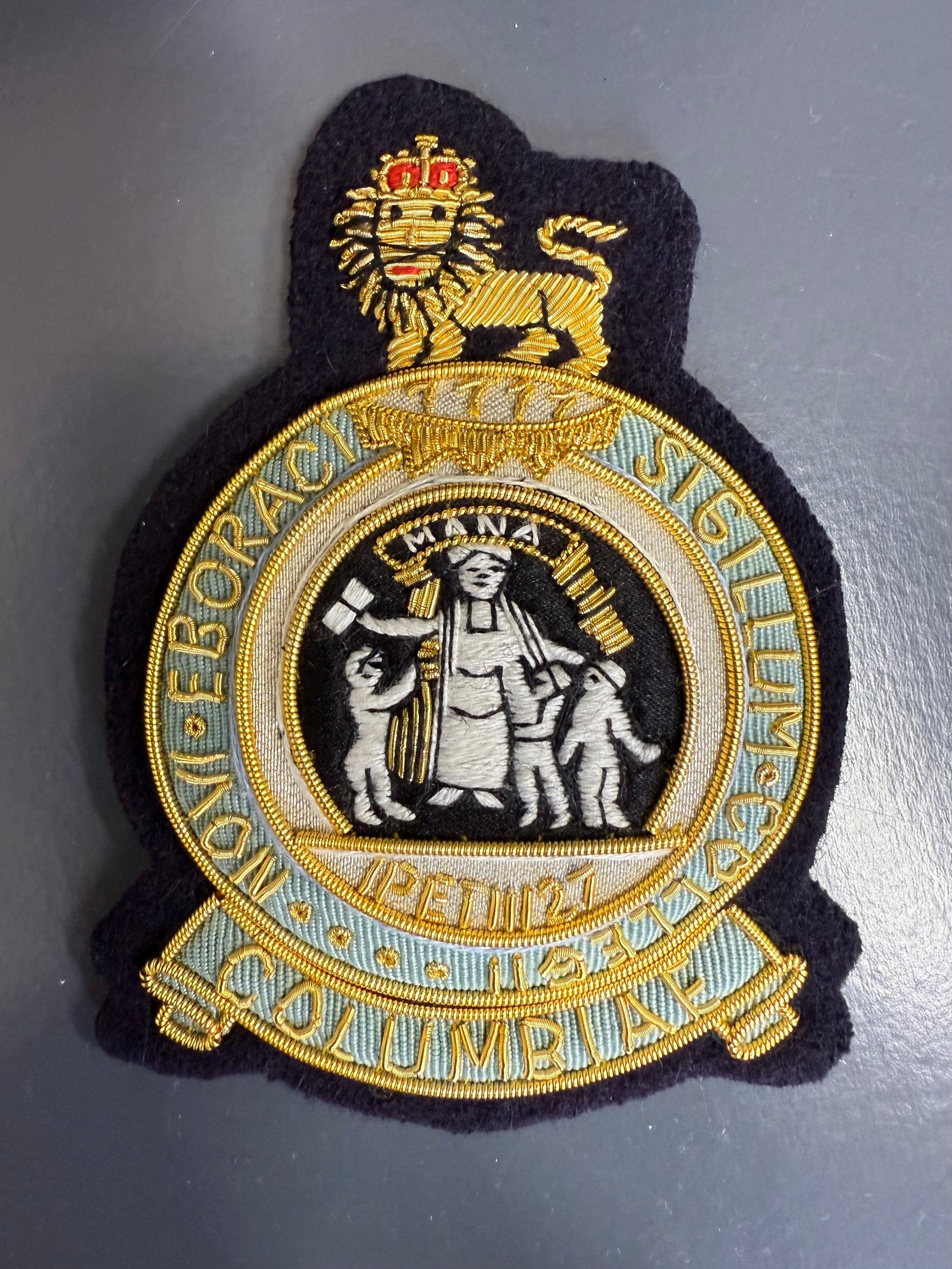 Columbia University Blazer Badge Embroidered patch with a lion emblem and text on a dark background
