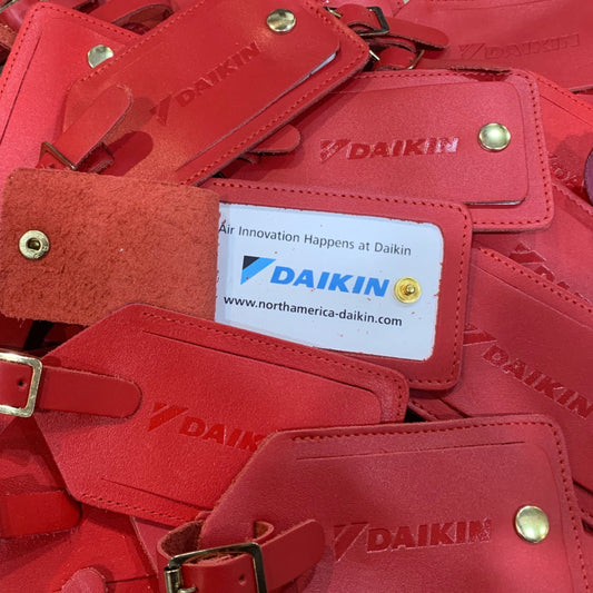 Leather Luggage Tags for DAIKIN | Cherry Blossom Event | Custom Stamping and Packaging | Made in England by Charing Cross
